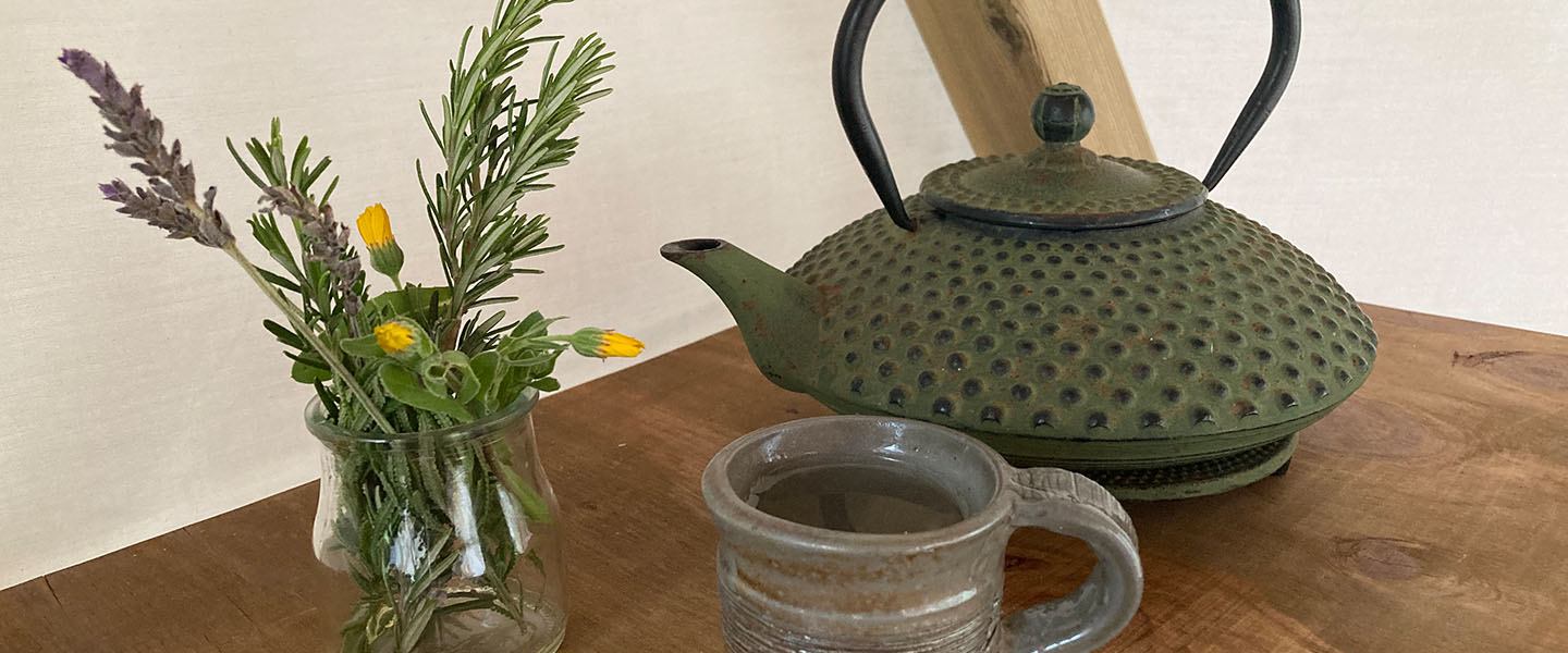 tea pot and ayurvedic herbs